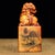 A substantial Chinese scholar's seal carved from Tianhuang Shoushan stone, topped with a finely modeled foo dog (guardian...