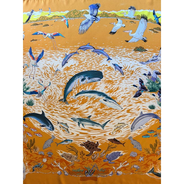 This Hermès "La Vie Précieuse de la Méditerranée" scarf is a tribute to the richness of marine life. It features whales,...