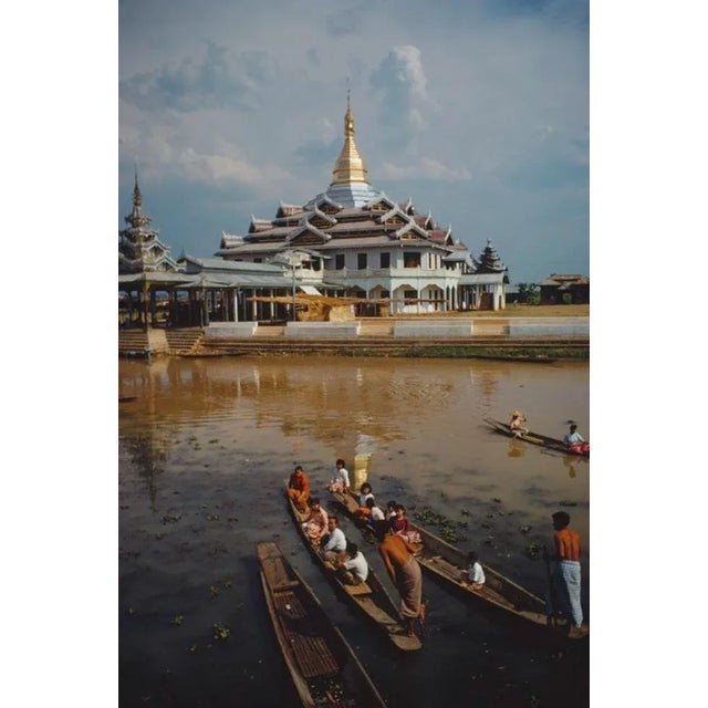 Hpaung Daw U Pagoda 1971 by Slim Aarons Slim Aarons Limited Estate Edition Boatmen, using the local leg rowing technique,...