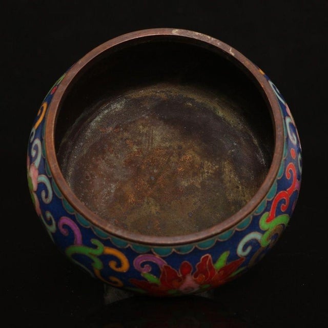 This is a beautifully crafted, low-profile incense burner (censer), featuring intricate cloisonné enamel work. The body is...