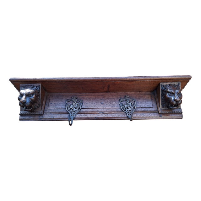 Wall Shelf in Oak with Lion Heads and Hooks For Sale