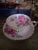Beautiful pink teacup and saucer with rose design.