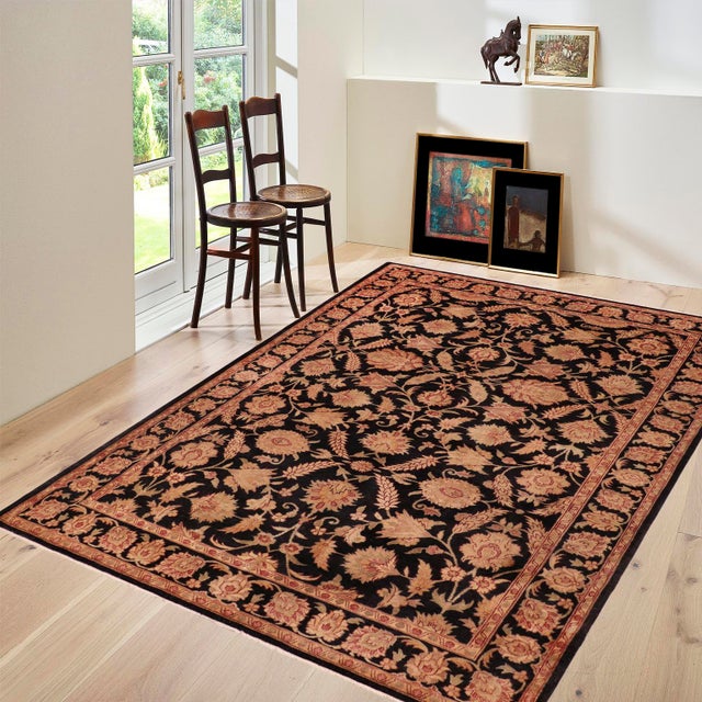 "Enhance the ambiance of your home with this magnificent Persian-influenced Turkish hand-knotted rug made by skilled...