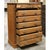 Crafted in a traditional rustic style, this piece features a warm oak finish with prominent grain patterns throughout....