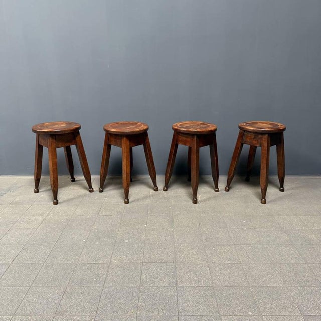 Beautiful unique set of 4 antique Arts & Crafts ''pub stools'' from England, around 1910. These stools are made of elm...