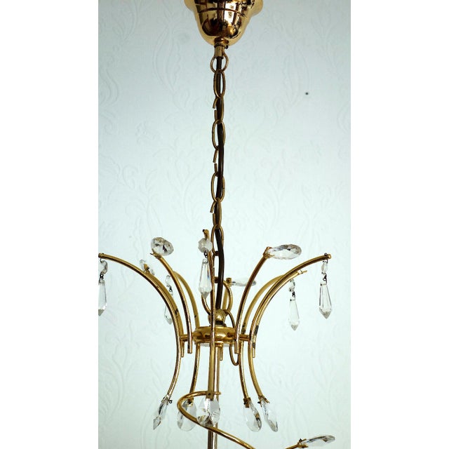 Brass and Lead Crystal 5-Light Chandelier, 1970s, in Very Good conditions. Designed 1970 to 1979 I have official proof of...