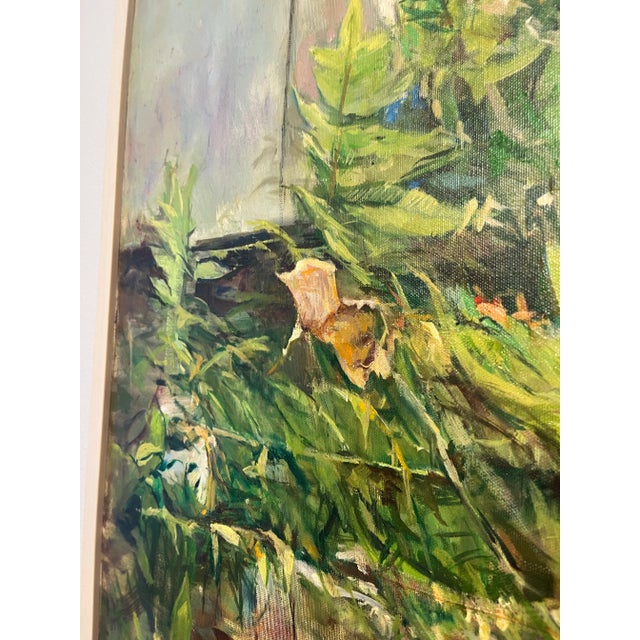 Beautiful vintage oil painting of a lush garden with silvery box. No visible signature. Newly professionally framed.