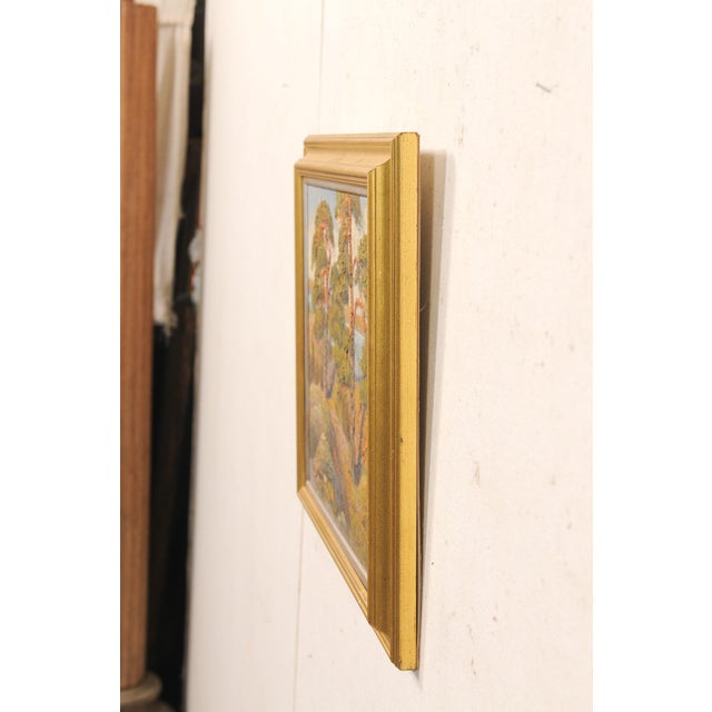 A Swedish coastal landscape painting, in gilt frame, from the mid 20th century. This vintage painting from Sweden depicts...