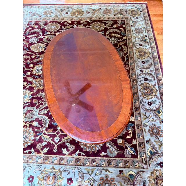Brown Ethan Allen 18th Century Chippendale Style Banded Mahogany Oval Coffee Table With Claw and Ball Feet For Sale - Image 8 of 13
