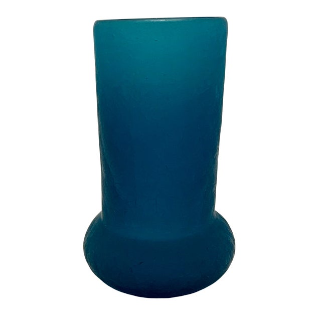 Vintage crackle glass vase in a rich deep turquoise color. This piece features a classic ice glass texture with a...