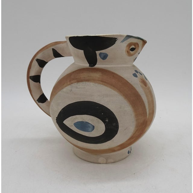 Petite chouette (A.R. 82) stamped 'Madoura Plein Feu / D'Après Picasso' (underneath) white earthenware ceramic pitcher...