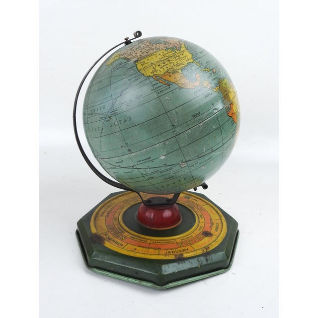 Vintage 1930's 6" dia. metal astrological world globe. Manufactured by J. Chein & Co. an American company founded in New...