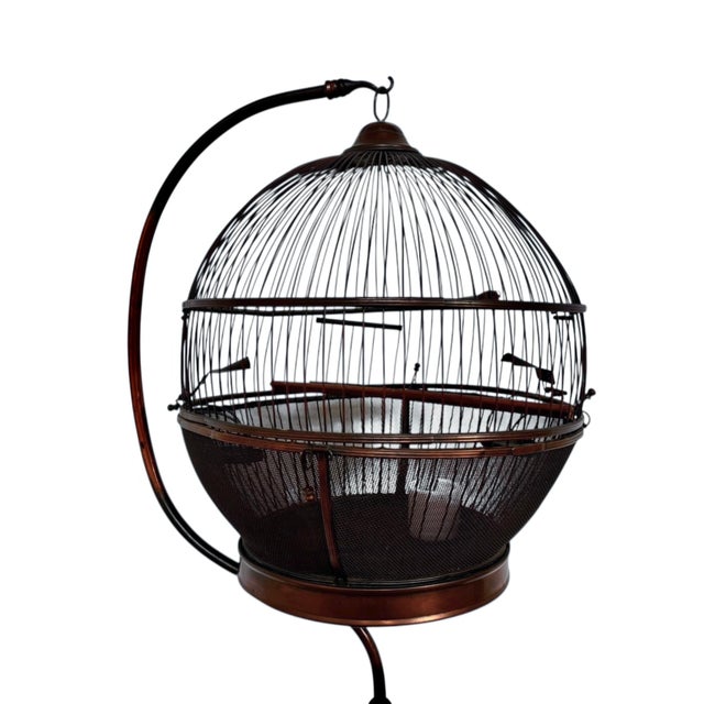 17 1/2” diameter x 66”H Base: 9” Diameter Bird Cage: 14” Diameter x 18”H This exceptional architectural bird cage presents...