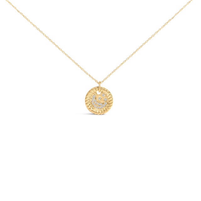 Embrace the celestial elegance with this exquisite pendant necklace, finely crafted from luxurious 10K yellow gold. The...