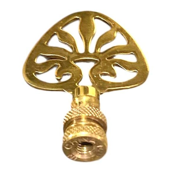 Elegant vintage solid brass lamp finial featuring a stylized Tree of Life motif with openwork detailing. The warm patina...