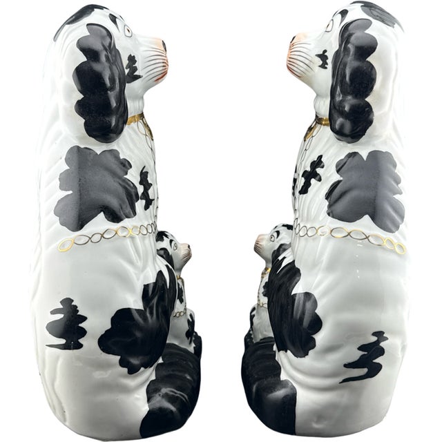 Vintage Staffordshire Spaniel Dog and Pup Figurine Pair, Black and White with Gold Accents This whimsical pair of large...