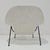 The iconic Eero Saarinen for Knoll Womb Chair, newly upholstered in an exquisite bouclé with black frame.