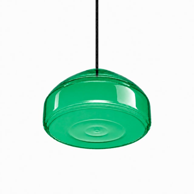 Crafted with high visual clarity, this modern pendant lamp features a sleek silhouette hand-blown from premium glass in a...