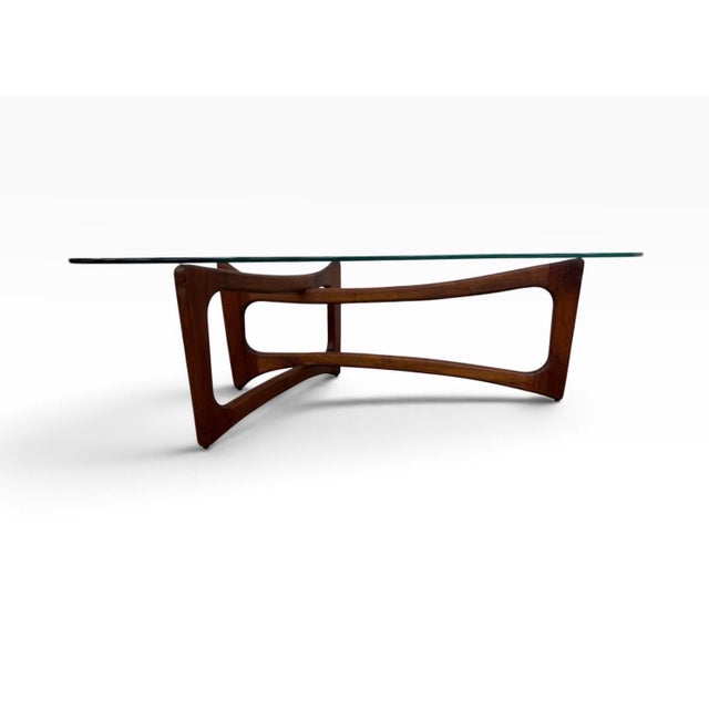 Make a statement with this rare Mid-Century Modern Adrian Pearsall for Craft Associates glass-top walnut coffee table,...