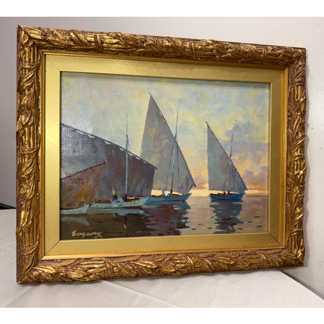 This vintage original oil painting on canvas by artist Evgeny depicts a nautical sailboat scene in an expressionist style....