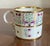 Antique early 19th century Paris porcelain coffee cup or can by Dihl circa 1800. Decorated with floral sprig in shades of...