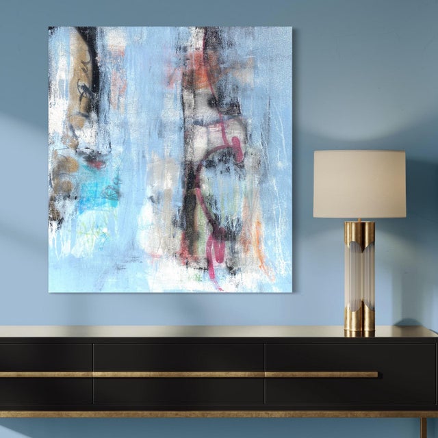 This blue abstract painting is on a heavy textured canvas with an abstract composition of layered colors, gestural...