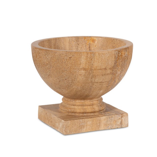 Pure in form and classical in spirit, the vase is a study in proportion and restraint. Its gently tapered vessel rests...