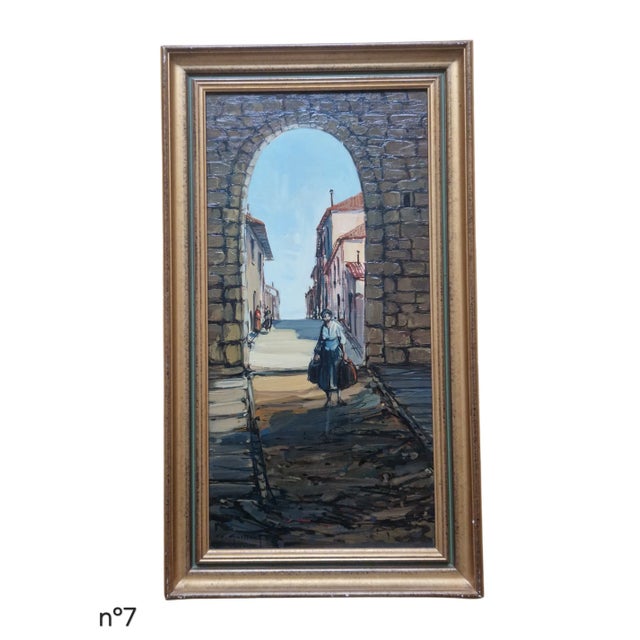 Oil on canvas depicting a European street scene framed by a stone archway, with a figure walking toward the viewer...