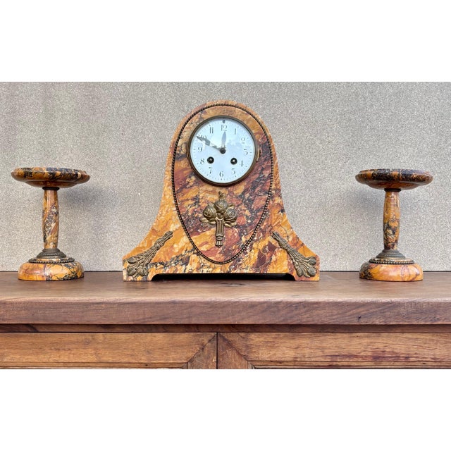Classic French mantel clock from the early 20th century, manufactured by the prestigious Société Clusienne in Cluses, the...