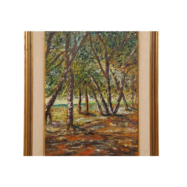 A 20th century impasto oil on artist board. The scene depicts a forest edge, with a colorful forest floor and light along...