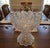 Striking oversized cut crystal pedestal punch bowl by Maple City Glass, featuring intricate American Brilliant–style...