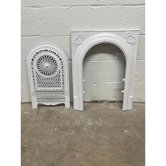 Beautiful design fireplace surround and insert Add timeless charm to your home with this authentic antique cast iron...