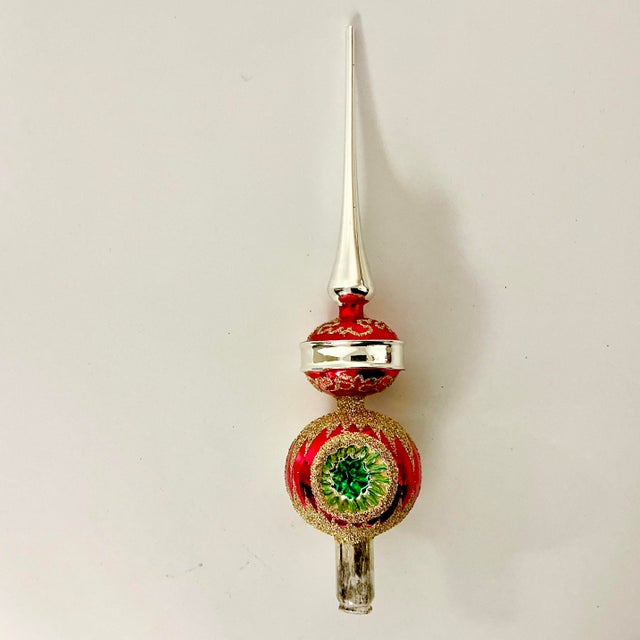 Vintage Home is pleased to present this Antique Hand Blown Mercury Glass Christmas Tree Topper from Germany. The piece is...