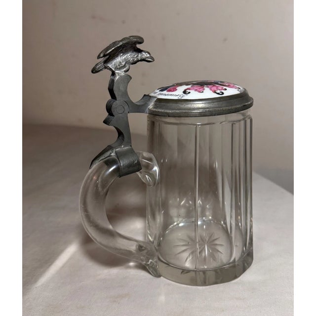 Up for sale is a nice quality antique 19th century lidded German armorial beer stein. The pewter lid has a wonderful con-...