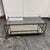 Design Plus Gallery presents a Vintage Hollywood RegencyMetal + Mirrored Glass Cocktail Table. This rectangular cocktail...