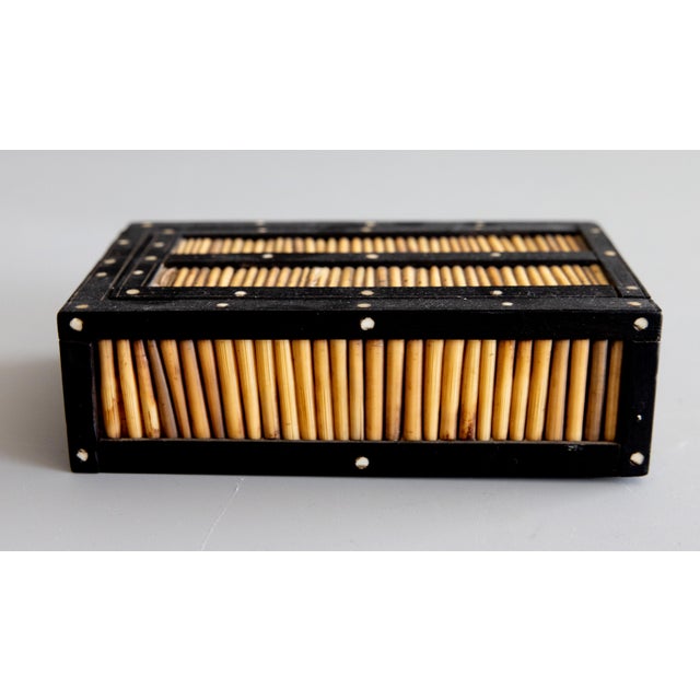 A fine antique 19th-Century British Colonial porcupine quill and ebony box, made in Ceylon the colonial name for Sri...