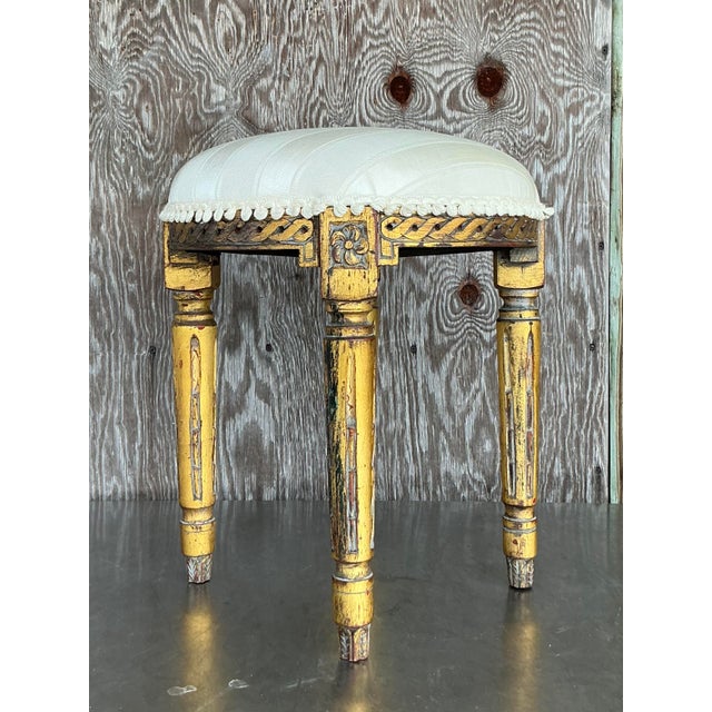 Add a touch of antique elegance to your space with this stunning vintage giltwood vanity stool. Featuring intricately...