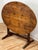 Antique French Country style tilt-topped wine tasting table. Used by wine-makers throughout France, these tables feature...