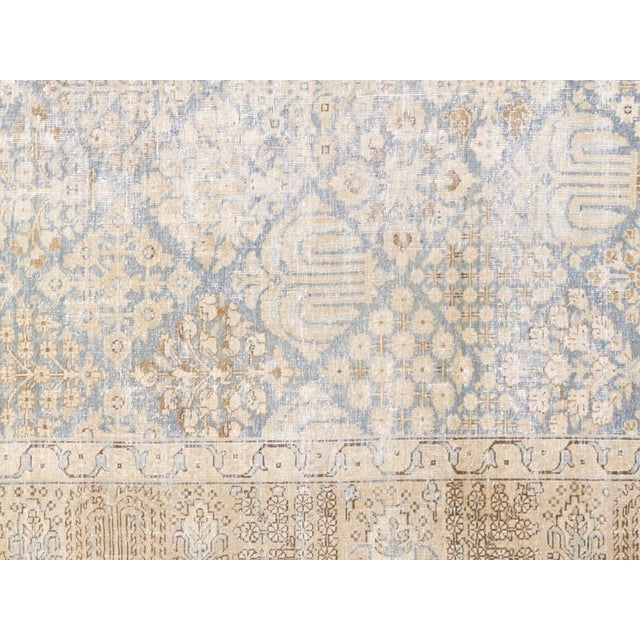 This 8'5" x 10'6" Semi Antique Persian Tabriz Rug is a timeless piece that combines Persian craftsmanship with lasting...