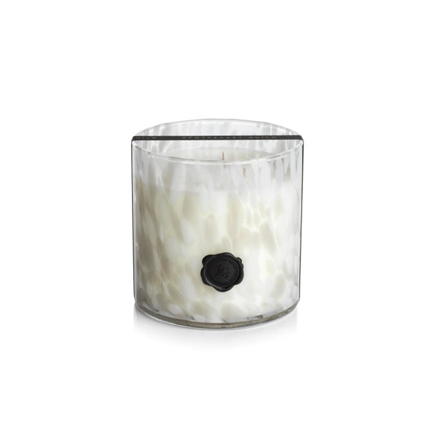 Infuse a luxury fine fragrance and light into your home with this lovely candle. Its elegant glass jar design with seal...