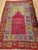 This vintage Turkish Anatolian area rug from the early 20th century features a beautifully executed prayer Mihrab design...