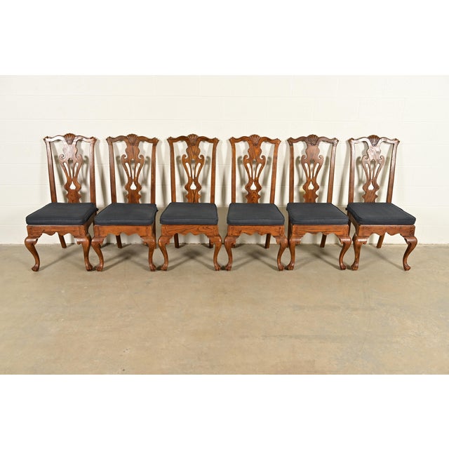 An outstanding set of six Chippendale or Georgian style dining chairs By Henredon USA, Circa 1980s Carved solid oak...