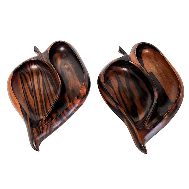 Offered is a set of 2 1960s hand-carved Pepper shaped partitioned bowls in rare Philippine Kamagong wood. They are stamped...