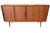 A magnificent Danish cabinet in golden brown teak with beautiful grain and a carefully crafted design. Model 19 from Omann...
