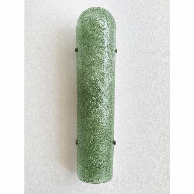 Contemporary luxury modern wall sconces made in green hammered murano glass with a traditional working of "graniglia". lot...