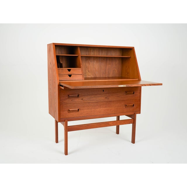 Mid-Century Teak Secretary by Arne Wahl Iversen, 1960s, in Very Good conditions. Designed 1960 to 1969 This piece has an...