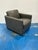 Stylish modern Leather Swivel Chair Dark Grey leather track arm. Showroom floor sample.