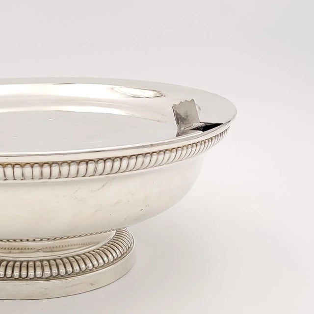 A Danish silver hot water dish, late 19th century, missing original leather handle.
