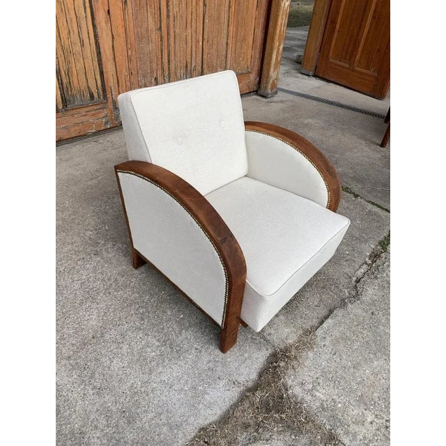 Art Deco lounge chair, circa 1920s. Restored and re-upholstered. wood black They are period 1920s-1930s Art Deco chairs,...