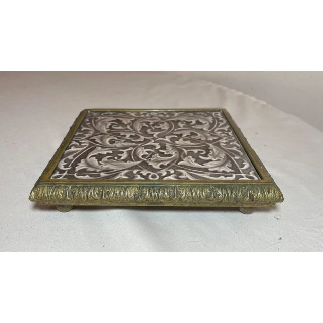 Up for sale is a rare antique handmade Providential Tile Works pottery tile mounted as a trivet base. The tiles done with...